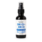 A 2 oz black glass spray bottle of Happy Soul Organics GHK-CU + AHK-CU Hair Serum with a white label and blue text, set against a plain white background.